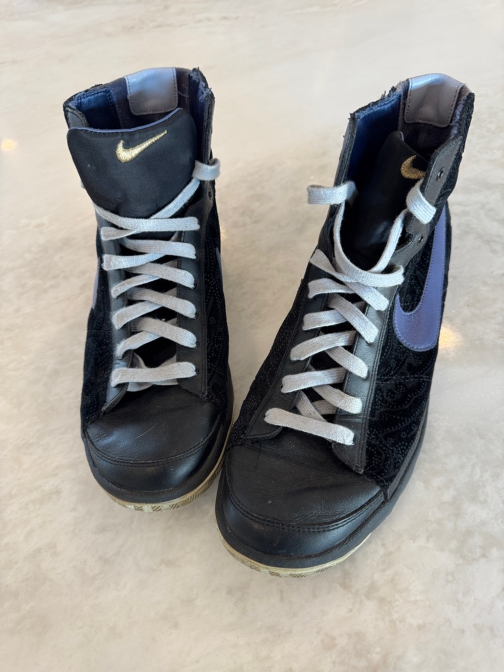 Nike Women's Black High-Top Sneakers with Purple Swoosh and Gold Logo